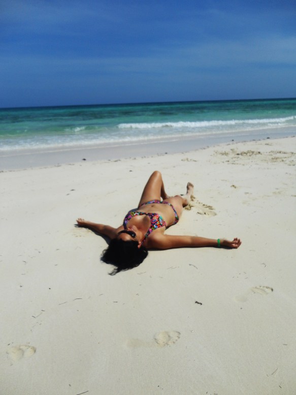 Lying on an isolated beach at the Bahamas. My reward for getting off the tourist infested resort!